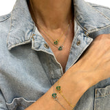 Bransoletka srebrna pozłacana złączone serca z zieloną emalią