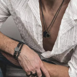 Bransoletka męska na skórzanym czarnym pasku ze stali szlachetnej z czarnym agatem