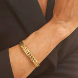 Złota bransoletka sztywna pleciona