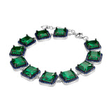 Bransoletka srebrna ogniwkowa z granatowymi i zielonymi cyrkoniami