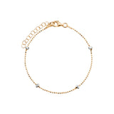 Bransoletka srebrna pozłacana z fasetowanymi kulkami