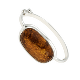 Srebrna bransoletka sztywna z owalnym brązowym bursztynem