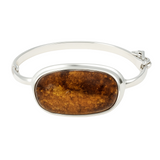 Srebrna bransoletka sztywna z owalnym brązowym bursztynem