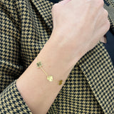 Bransoletka złota na łańcuszku z geoemtrycznymi zawieszakmi: serce, kółko i kwadrat