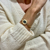 Zegarek złoty z czarną tarczą