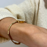 Zegarek złoty z czarną tarczą