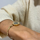 Zegarek złoty z czarną tarczą