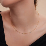 Naszyjnik srebrny pozłacany z fasetowanymi kulkami