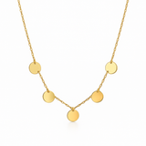 Złoty naszyjnik z wiszącymi elementami monety