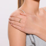 Złoty pierścionek z misterną plecionką i cyrkoniami