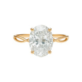 Złoty pierścionek z dużą białą cyrkonią