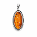 Owalna srebrna zawieszka z naturalnym bursztynem